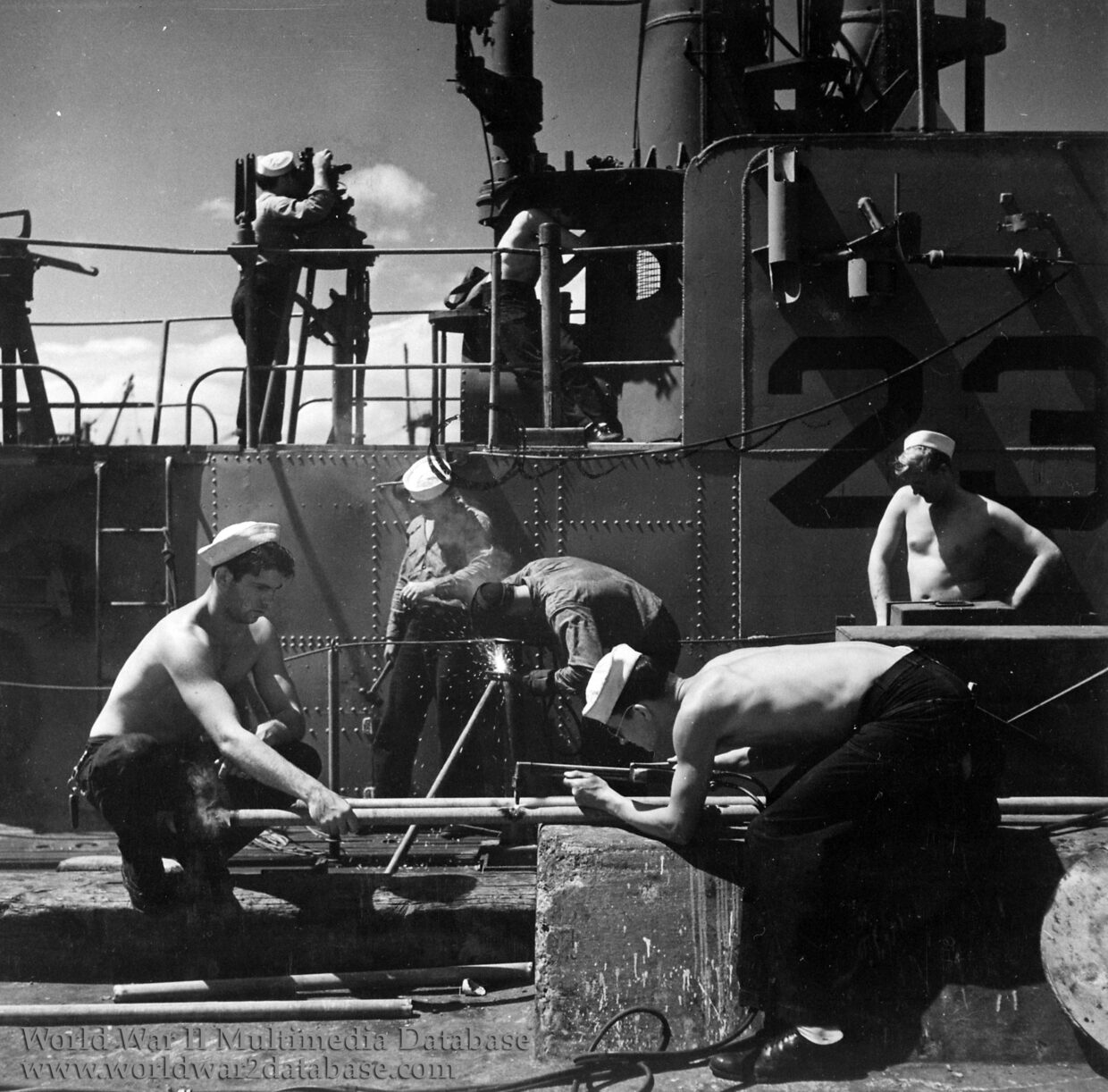 Sailors Work on a Submarine