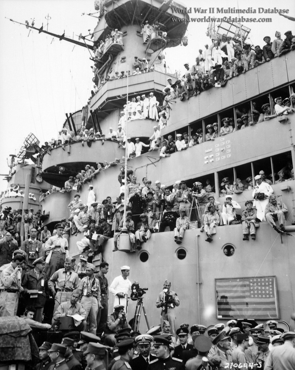Spectators and photographers crowd USS Missouri (BB-63)