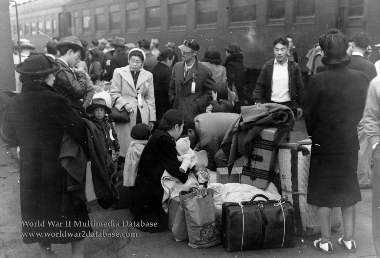 Japanese Americans Wait for Special Train to Take Them to Manzanar War Relocation Center