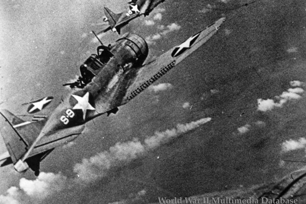 Douglas SBD-3 Dauntlesses Attack Japanese Cruisers
