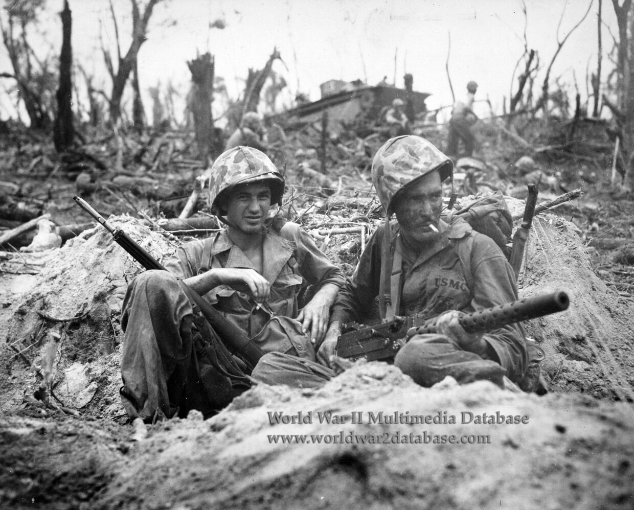 Marines Gerald P. Thursby and Douglas D. Lightheart Smoke During Battle of Peleliu