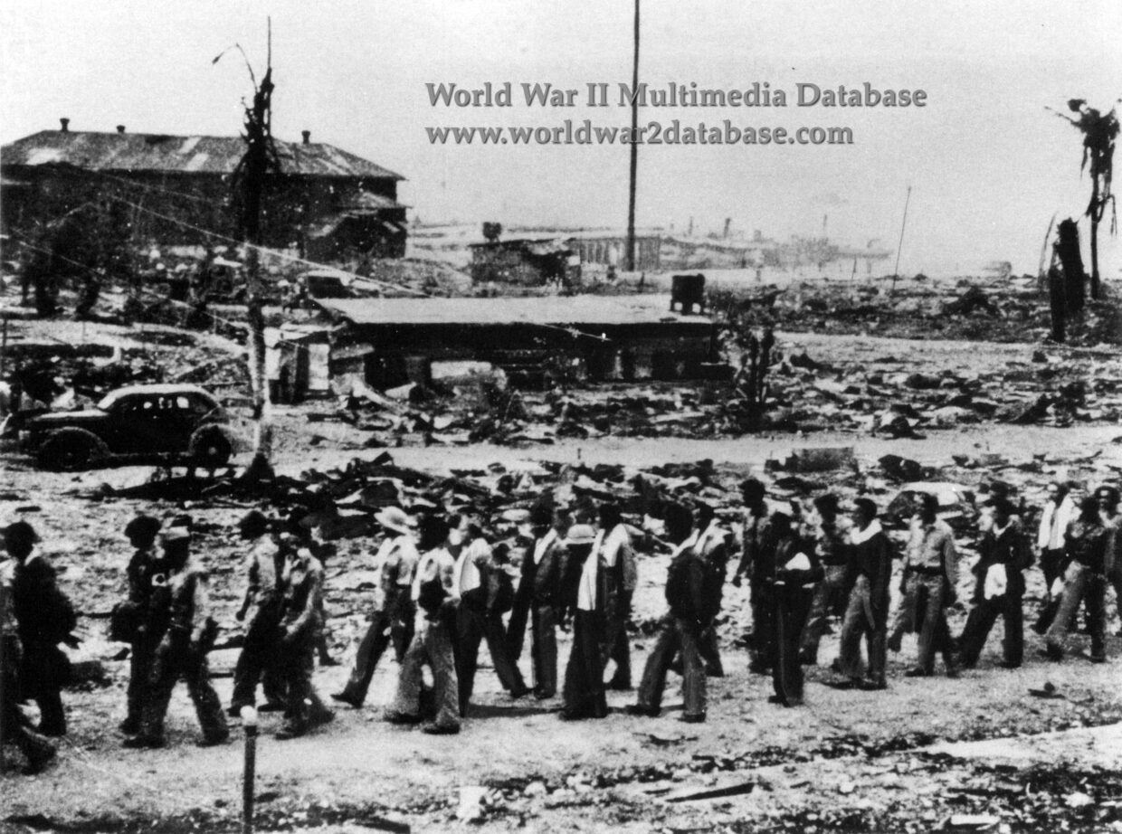 American Prisoners March Past Barrio San Jose and the South Dock on Corregidor