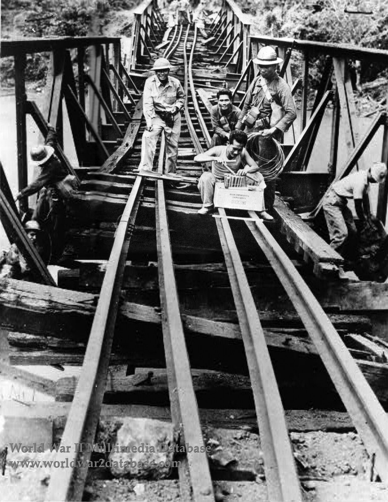 1Fourth Engineers (Philippine Scouts) Wire Railroad Bridge For Demolition